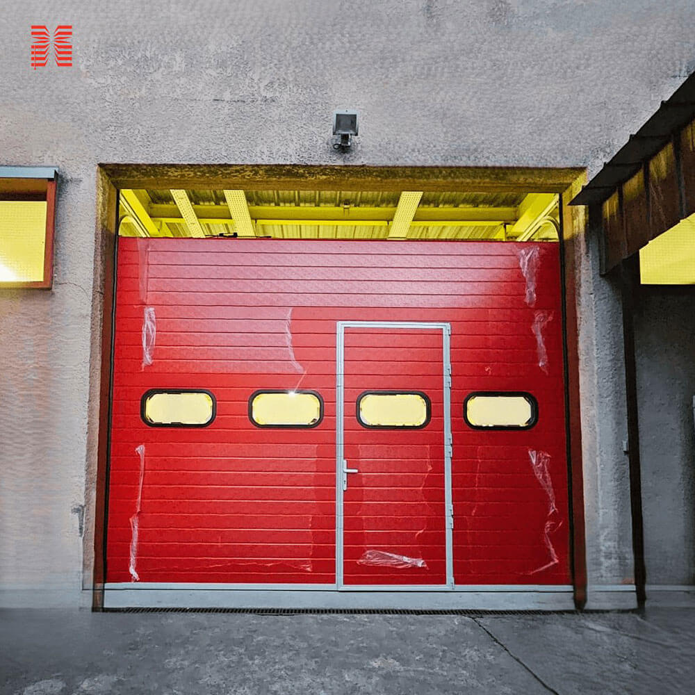 Installation porte sectionnelle industrielle - Xpert Maintenance