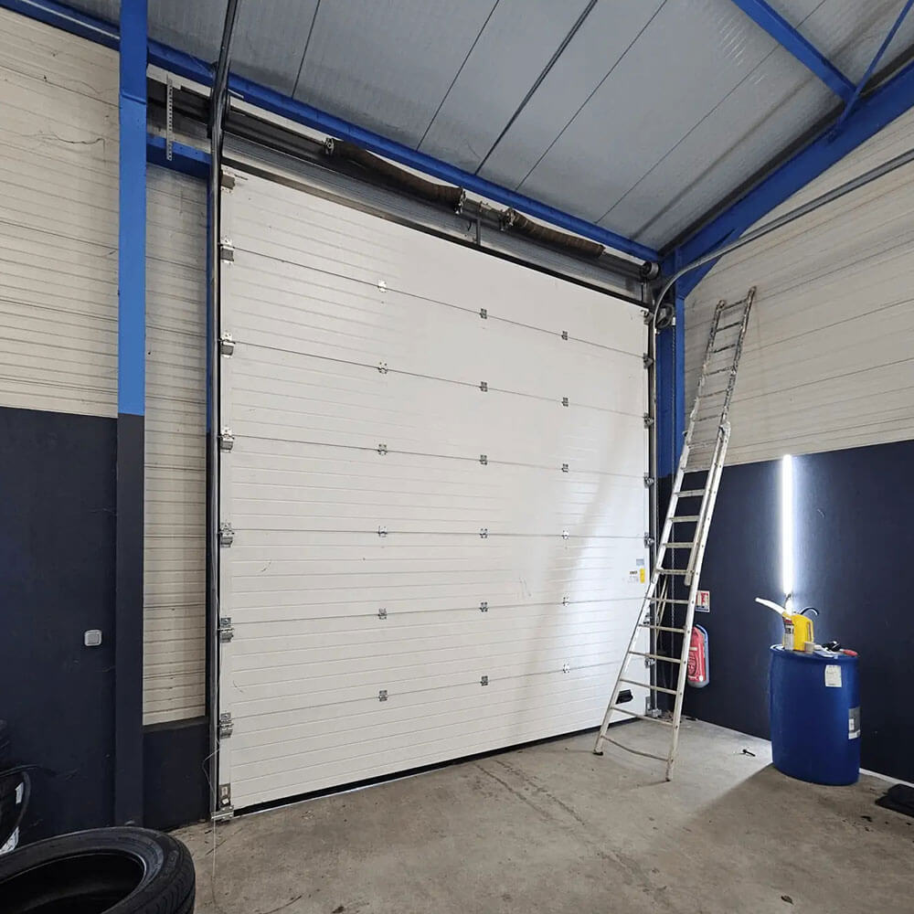 Installation Sur Mesure Porte Sectionnelle Industriel - xpert maintenance
