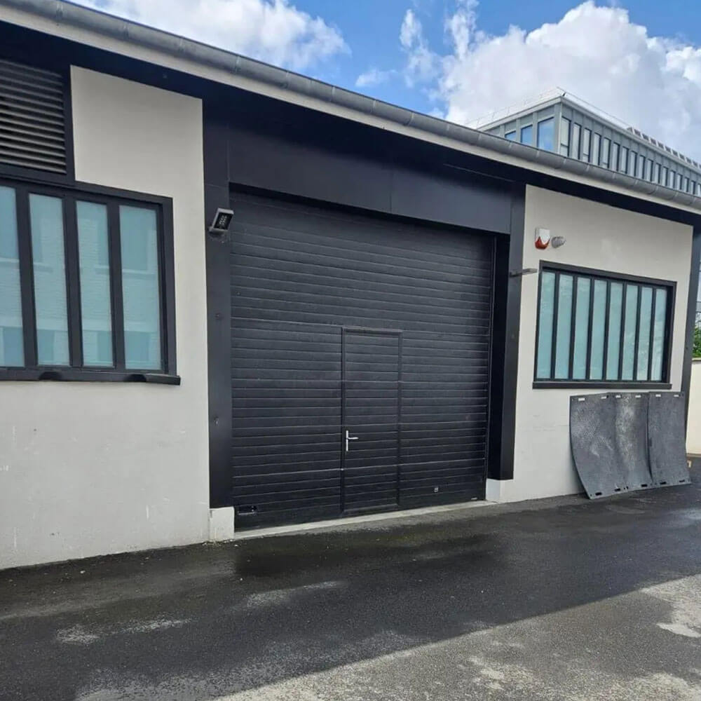 Installation Sur Mesure Porte Sectionnelle Industriel - xpert maintenance