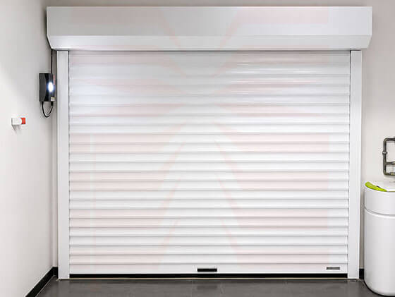Installation et pose de porte de garage enroulable- Xpert Maintenance
