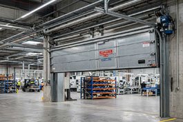 Porte coupe-feu sectionnelle - Xpert Maintenance